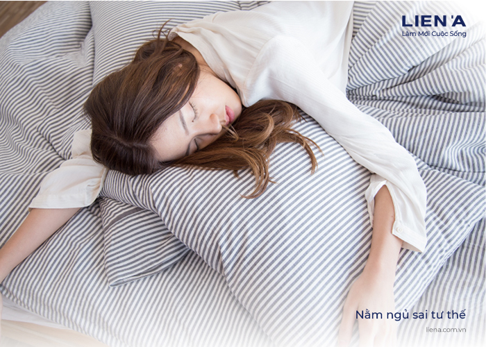 ngủ dậy bị đau lưng